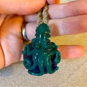 Hand blown glass octopus pendant on hemp